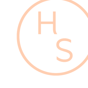 A peach-colored circle with the letters H and S inside it, positioned diagonally, on a white background. The upper right portion of the circle is out of frame.
